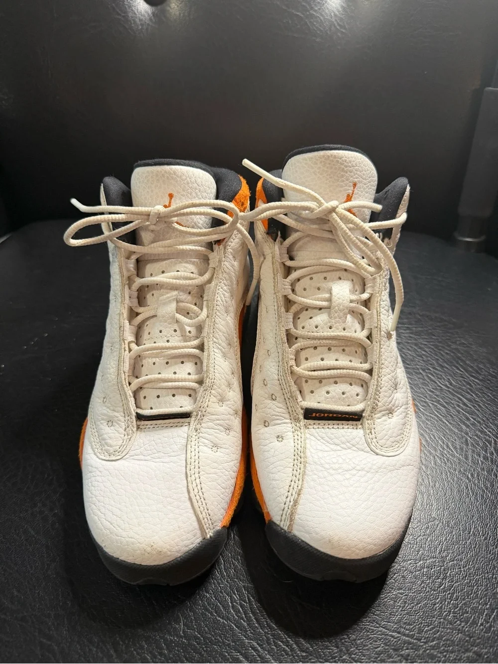 Jordan Black and Orange Low-Top Sneakers